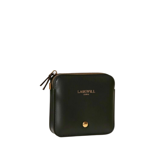 Larkwell black leather waste bag holder with brass zipper, waterproof lining, and debossed logo on a white background