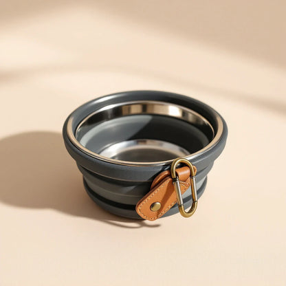 Larkwell The Trail Bowl in charcoal with a stainless steel basin, silicone walls, and a brass carabiner on leather.