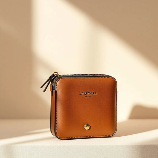 Larkwell The Pocket Carry chestnut tan leather dog waste bag dispenser with brass zip and debossed logo