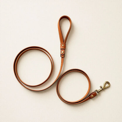 Larkwell The Wander Lead in chestnut tan full-grain leather with solid brass hardware and hand saddle-stitched detail.