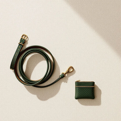 Larkwell The Night Walk Set featuring a green leather LED dog collar, rolled leather lead, and matching waste-bag pouch.