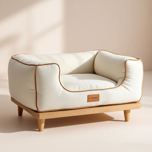 Larkwell The Manor Bed in cream bouclé with contrast piping, memory foam, and a solid oak frame with tapered legs.